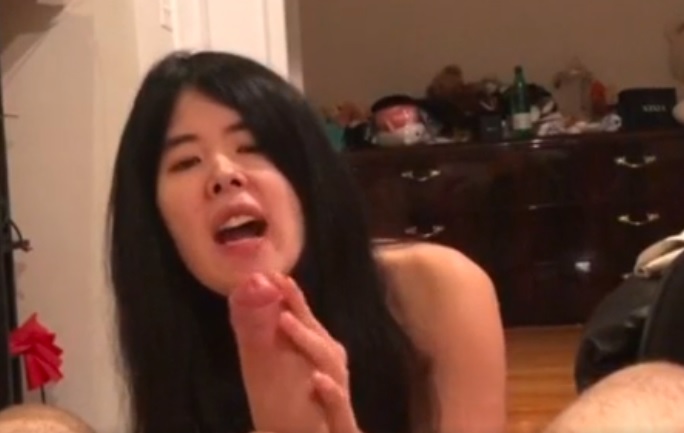 Asian-cutie-edging-of-a-big-white-dick